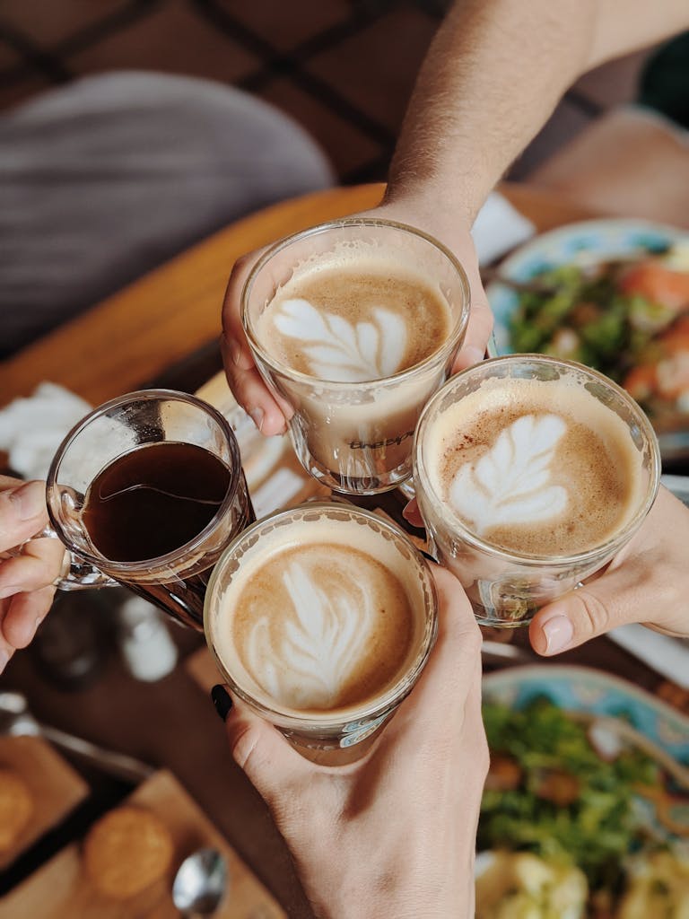 Enjoying delicious coffee with friends, perfect morning moment.